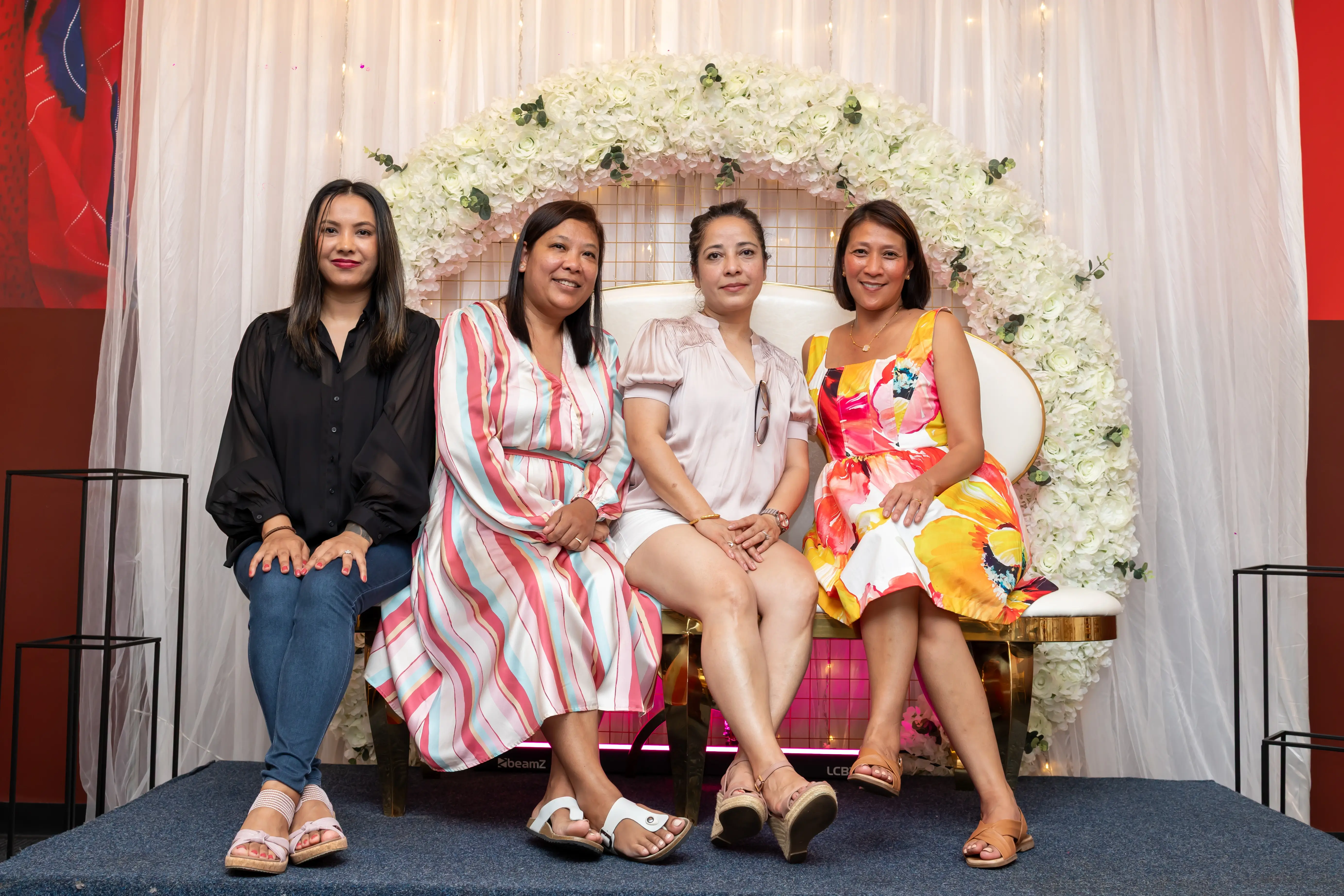 Four women gathered at a function in semi-formal attire, posing for a group photo. All are smiling and enjoying themselves at an event held at Third Eye Windsor, 515 George St, South Windsor NSW 2756.